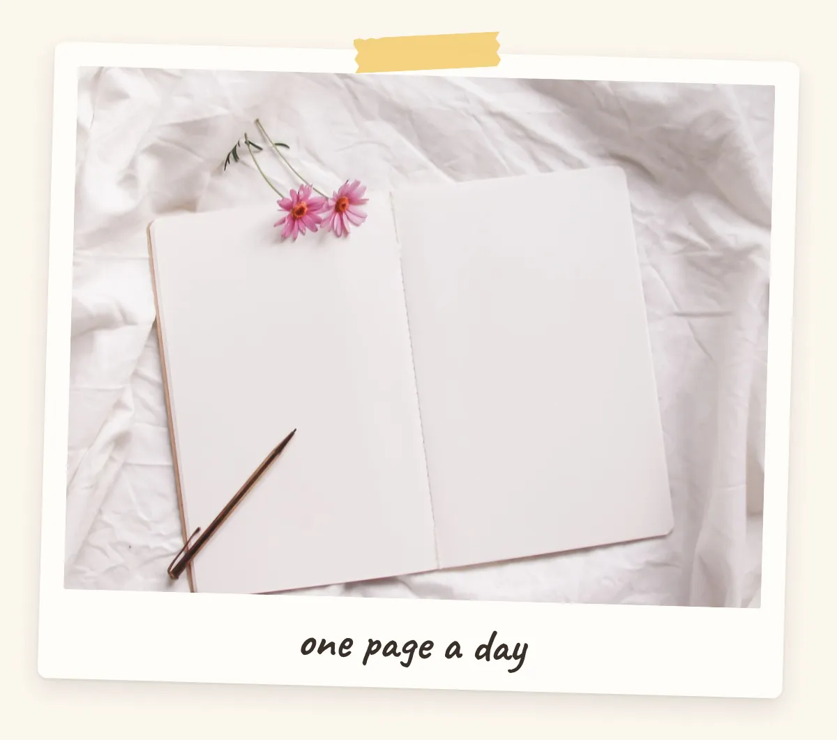 Open blank journal with a pencil and pink flower for a personal growth vision board